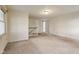 Inviting living room with staircase and large windows, perfect for entertaining and relaxation at 502 S Harrison St, Alexandria, IN 46001