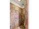 Tiled shower with a hand-held shower head and a built-in seat at 502 S Harrison St, Alexandria, IN 46001