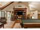Cozy game room featuring a pool table, custom bookshelves, and stylish decor at 535 W 93Rd St, Indianapolis, IN 46260