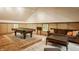 Relaxing game room with a pool table, comfortable seating, and a decorative rug at 535 W 93Rd St, Indianapolis, IN 46260