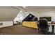 Inviting living room with a comfortable sofa, work desk, and television for relaxation and entertainment at 535 W 93Rd St, Indianapolis, IN 46260