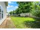 Well-maintained backyard features a lush lawn and privacy fence at 539 Deer Trail Dr, Indianapolis, IN 46217