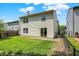 View of the home's backyard with grass and a fence line at 539 Deer Trail Dr, Indianapolis, IN 46217