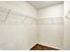 Walk-in closet features wood floors, wire shelves, and ample storage space at 539 Deer Trail Dr, Indianapolis, IN 46217