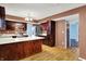 Spacious kitchen featuring modern appliances, a large island, and wooden cabinets at 539 Deer Trail Dr, Indianapolis, IN 46217