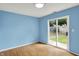 This living room has a sliding glass door to the backyard at 539 Deer Trail Dr, Indianapolis, IN 46217