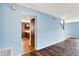Spacious living room features a doorway to the kitchen and stairs to the upper level at 539 Deer Trail Dr, Indianapolis, IN 46217