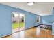 The living room has a sliding glass door that leads to the backyard at 539 Deer Trail Dr, Indianapolis, IN 46217