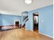 The living room features hardwood floors, a fireplace, and stairs leading to the upper level at 539 Deer Trail Dr, Indianapolis, IN 46217