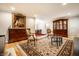 Elegant living room showcasing hardwood floors, classic furniture, and ample space for entertaining at 5415 Kilmer Ln, Indianapolis, IN 46250