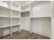Bright and organized walk-in closet features custom shelving and ample hanging space at 5682 Broadway St, Indianapolis, IN 46220