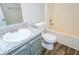 Cozy bathroom featuring a granite countertop vanity, toilet, and a tub and shower combo at 6121 Jester Ct, Indianapolis, IN 46254