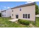 Backyard showcasing a patio, lawn, and exterior view of the home's design at 6528 Abby Ln, Zionsville, IN 46077