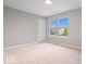 Bright bedroom with carpet and large windows with plenty of natural light at 6528 Abby Ln, Zionsville, IN 46077