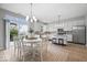 Bright dining area adjacent to the kitchen featuring sliding door access to the backyard at 6528 Abby Ln, Zionsville, IN 46077