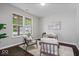 Cozy living area with hardwood floors, large windows and natural lighting at 6528 Abby Ln, Zionsville, IN 46077