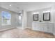 Main bathroom with double vanity, glass shower, and tile flooring at 6528 Abby Ln, Zionsville, IN 46077