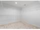 Walk-in closet with ample storage space and neutral carpeting at 6528 Abby Ln, Zionsville, IN 46077