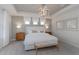 Bright main bedroom with tray ceilings, abundant natural light, and elegant furnishings at 6868 Jacone Dr, Brownsburg, IN 46112