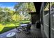 Inviting back deck with a dining table and chairs, perfect for outdoor entertaining and relaxation at 710 N Spring St, Greenfield, IN 46140