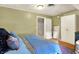 Bedroom featuring hardwood floors, a closet and queen size bed at 710 N Spring St, Greenfield, IN 46140
