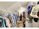 Walk-in closet featuring clothes racks and slanted ceiling at 710 N Spring St, Greenfield, IN 46140