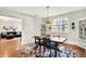 Dining room with hardwood floors, dining table and chairs at 710 N Spring St, Greenfield, IN 46140