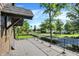 Outdoor deck overlooking street with trees and a blue water tower in the distance at 710 N Spring St, Greenfield, IN 46140