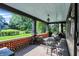 Inviting front porch with comfortable seating area for relaxing and entertaining at 710 N Spring St, Greenfield, IN 46140