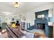Inviting living room with a fireplace and wood floors at 710 N Spring St, Greenfield, IN 46140