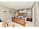 Bedroom with wooden bed frame, quilt, and natural light at 73 Suncrest Dr, Greenwood, IN 46143