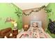 A bedroom featuring a single bed, chair and decoratively decorated walls at 73 Suncrest Dr, Greenwood, IN 46143