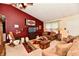 Relaxing living room with rocking chair, sofa, TV, and stylish Southwestern decor at 73 Suncrest Dr, Greenwood, IN 46143
