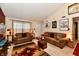 Spacious living room features two sofas, a decorative rug, and natural light at 73 Suncrest Dr, Greenwood, IN 46143