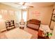 Charming Bedroom with crib, rocking chair, and soft decor at 7322 Stones River Dr, Indianapolis, IN 46259