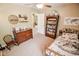 Bedroom featuring a ceiling fan, natural light, plush carpet, and ample storage at 7322 Stones River Dr, Indianapolis, IN 46259