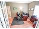 Home office with gym equipment, desk, and good light at 7322 Stones River Dr, Indianapolis, IN 46259