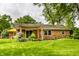 A beautiful backyard featuring a wooden pergola covered patio at 7580 Sherry Ln, Brownsburg, IN 46112