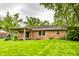 Exterior of home with a spacious backyard and pergola at 7580 Sherry Ln, Brownsburg, IN 46112