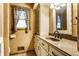 Bathroom with updated vanity and mirror at 7580 Sherry Ln, Brownsburg, IN 46112