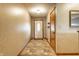 Bright entryway featuring tile floors, an oval-window door, and a wood-trimmed closet at 7580 Sherry Ln, Brownsburg, IN 46112