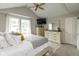 Spacious bedroom featuring a ceiling fan, large window and neutral walls at 8958 Wooster Ct, Fishers, IN 46038