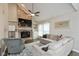 Inviting living room with a brick fireplace, built-in shelving, and comfortable seating at 8958 Wooster Ct, Fishers, IN 46038