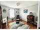 Neutral bedroom featuring wood floors and a comfortable sitting area at 932 Eagle Brook Cir, Shelbyville, IN 46176