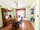 Formal dining room with hardwood floors and a large china cabinet at 932 Eagle Brook Cir, Shelbyville, IN 46176