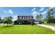 Charming two-story home with a well-manicured lawn, and attached two car garage at 932 Eagle Brook Cir, Shelbyville, IN 46176