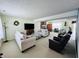 Spacious living room with a fireplace and plenty of comfortable seating at 932 Eagle Brook Cir, Shelbyville, IN 46176