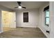 Bright bedroom featuring new wood flooring and an ensuite bathroom with tub/shower combo at 946 N Somerset Ave, Indianapolis, IN 46222