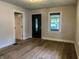 Bright living room featuring stylish flooring and fresh paint at 946 N Somerset Ave, Indianapolis, IN 46222