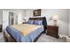 Comfortable bedroom featuring a king-size bed, bedside tables, and soft lighting at 963 Booneway Ln, Bargersville, IN 46106